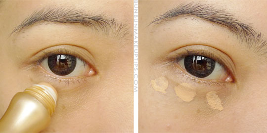 applying concealer to undereye